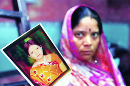 Sushma Pandey's Mother with her photo