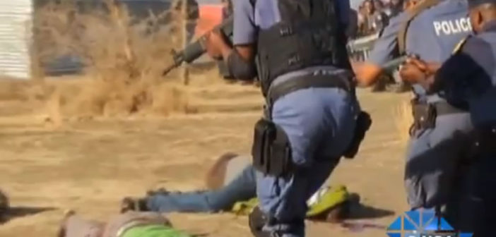 Police brutality at a mine in Marikana, South Africa