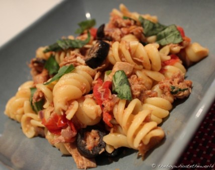 Fresh egg fusilli with tuna, vine-ripened tomatoes, anchovies, olives and basil