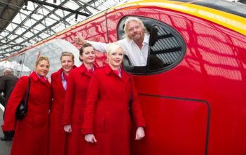 Richard Branson in a Virgin train