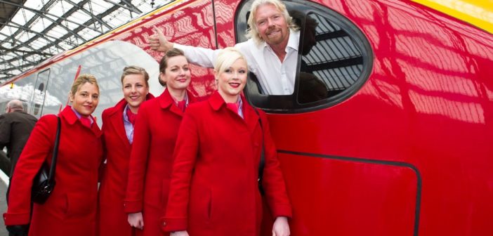 Richard Branson in a Virgin train