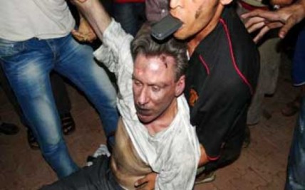 US Ambassador Christopher Stevens being dragged to safety?