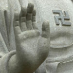 Swastika on a Buddha statue