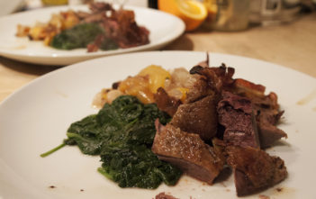 Roast mallard with pancetta and peaches