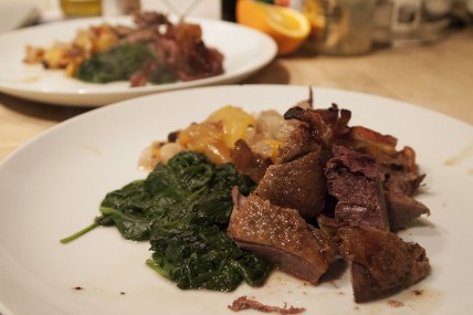 Roast mallard with pancetta and peaches