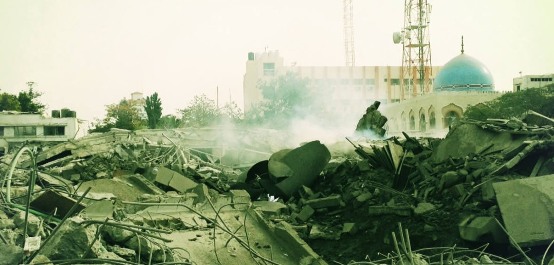 The smoldering Abu Khadra interior ministry compound, hit by 7-8 missiles last night in Gaza City