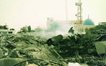 The smoldering Abu Khadra interior ministry compound, hit by 7-8 missiles last night in Gaza City