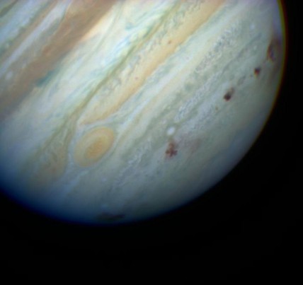 Jupiter’s scars from the impacts of comet Shoemaker-Levy 9. The solar system is a chaotic system. 