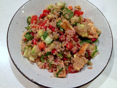 Quinoa with avocado, pomeggranate, and pistachios