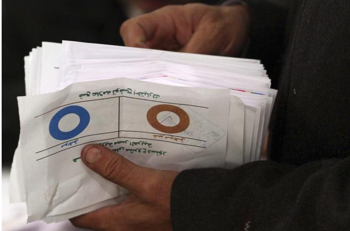Voting papers from Egypt's referendum on Morsi's controversial constitution