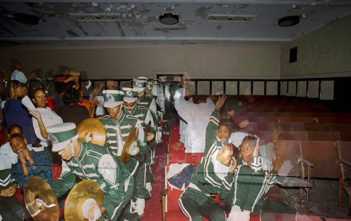 Pep band make their way through the crowd