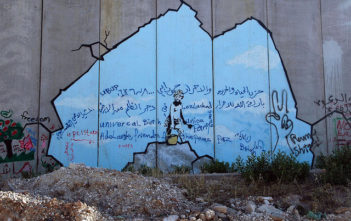 Graffiti on the wall separating the Palestinian West Bank and Israel