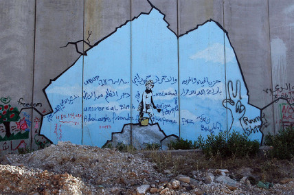 Graffiti on the wall separating the Palestinian West Bank and Israel