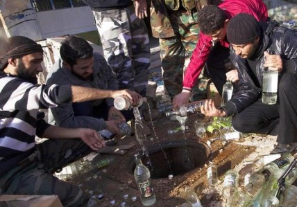 Islamists pour alcohol down the drain in Aleppo