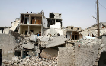 At least a dozen houses were destroyed in an attack on the Jabal Badro neighborhood in Aleppo city on February 18, 2013.