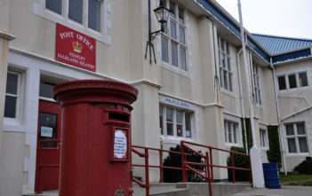 Traditional British red post box in Port Stanley, Falkland Islands