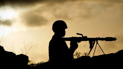 African Union soldier in Somalia holds a rocket-propelled grenade
