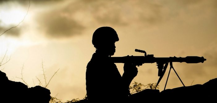 African Union soldier in Somalia holds a rocket-propelled grenade