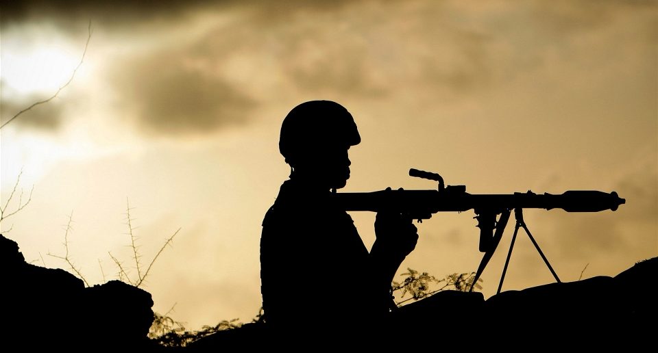 African Union soldier in Somalia holds a rocket-propelled grenade