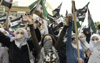 Women standing in solidarity with Syrian detainees and rebels