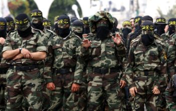 Islamic Jihad Militants pray during a Rally in Gaza city