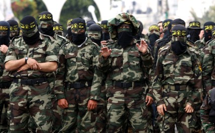 Islamic Jihad Militants pray during a Rally in Gaza city