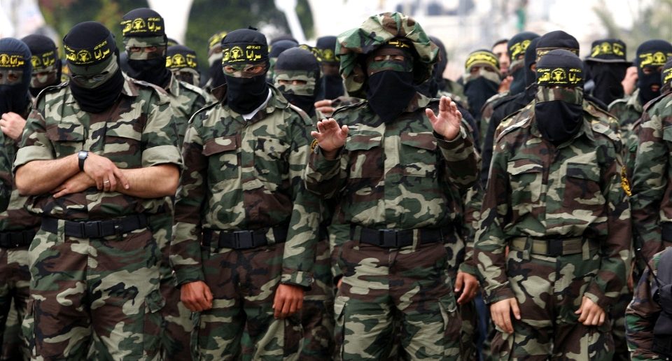 Islamic Jihad Militants pray during a Rally in Gaza city