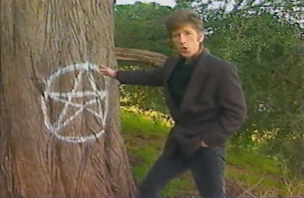 Still from TV show with presenter describing a "pentacle"
