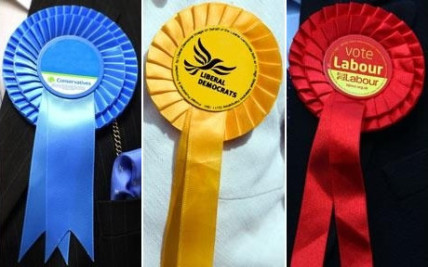 Rosettes of the Conservatives, Liberal Democrats, and Labour
