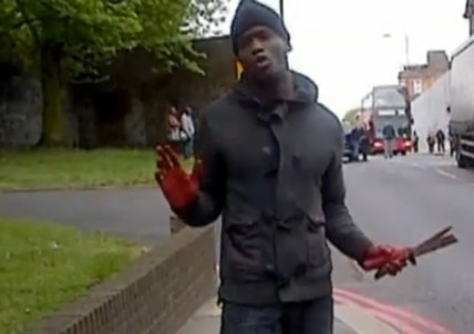 Woolwich attacker brandishing a knive with bloodied hands