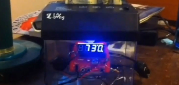 Money shredding alarm clock