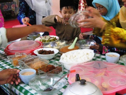 A family celebrate Eid Al-Fitr in Malaysia