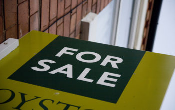 Real estate "For Sale" sign