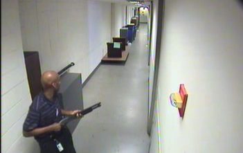 Aaron Alexis seen moving through the hallways of Building #197 carrying the Remington 870 shotgun.