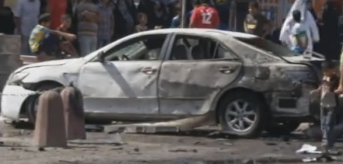 Destruction from a car bomb in Baghdad, Iraq
