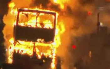 A bus burns during the 2011 London riots