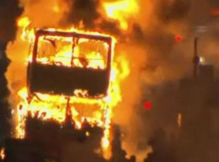 A bus burns during the 2011 London riots