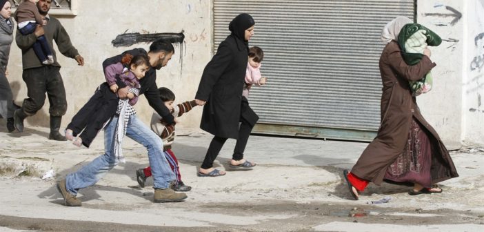 Syrian civilians flee from approaching army tanks