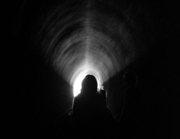 Silhouette in a tunnel