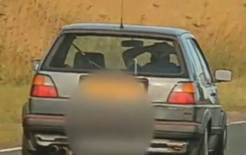 Man caught driving with no hands