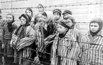Still photograph of child survivors at Auschwitz from the Soviet Film of the liberation of Auschwitz
