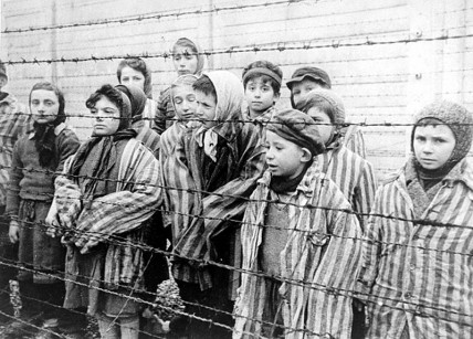 Still photograph of child survivors at Auschwitz from the Soviet Film of the liberation of Auschwitz