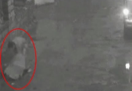 Man forces woman down manhole in China