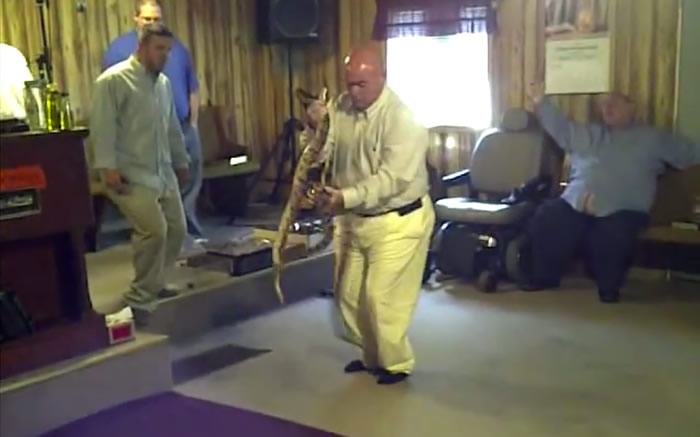 Pastor Coots handling snakes during a service at the Full Gospel Tabernacle In Jesus Name in Middlesboro, Kentucky in 2011