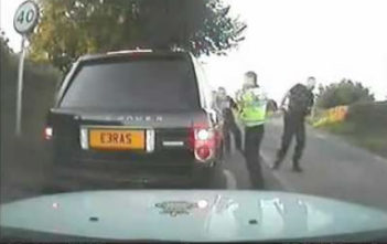 Police smash pensioners car window