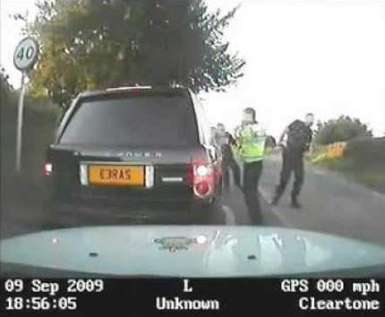 Police smash pensioners car window