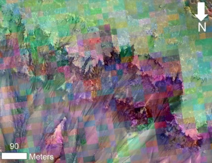 This image combines a photograph of seasonal dark flows on a Martian slope with a grid of colors based on data collected by a mineral-mapping spectrometer observing the same area.