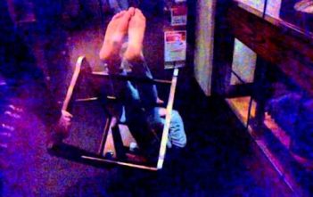 Teenager stuck in high chair