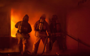 Firemen attending house fire