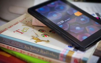 Amazon Kindle Fire e-reader and books
